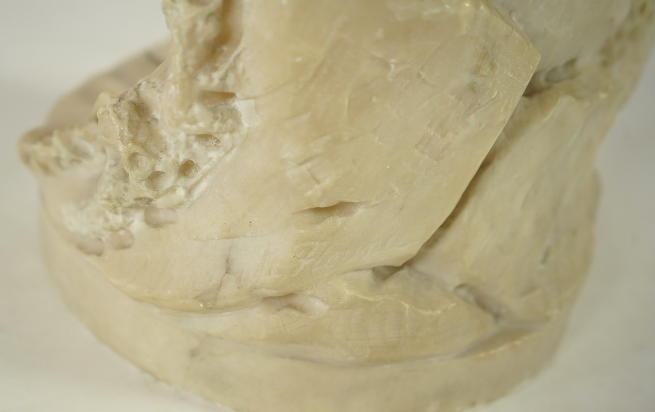 A Continental alabaster figure of a woman fishing, early 20th century